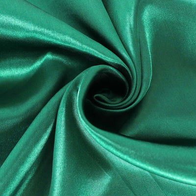 Green satin fabric with a smooth, glossy texture.