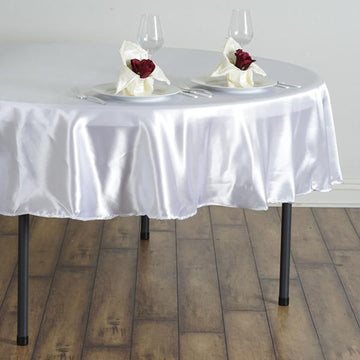 Enhance Your Event with the White Seamless Satin Round Tablecloth 90