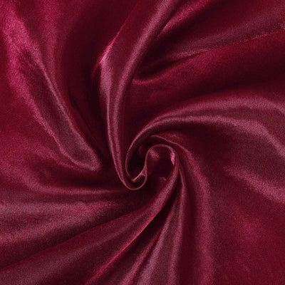 Burgundy satin fabric with a smooth, luxurious texture.