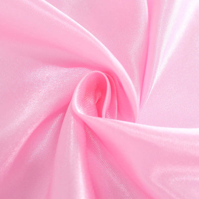 Pink satin fabric texture close-up, showcasing its smooth, glossy surface.