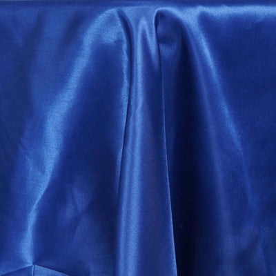 Smooth royal blue satin fabric draped elegantly.