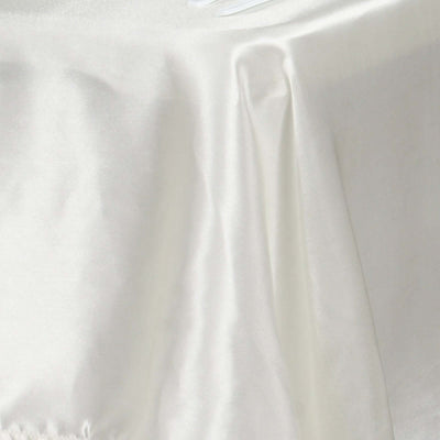 Elegant white satin fabric draping gracefully.