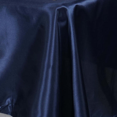 Navy blue satin fabric with a smooth, glossy texture