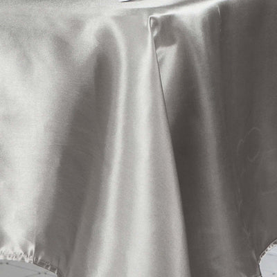 Elegant silver satin tablecloth with smooth texture.