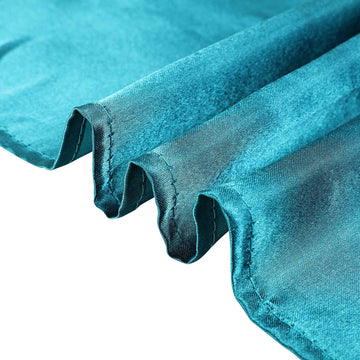 Dress Your Tables to Impress with a Teal Satin Tablecloth