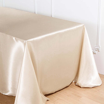 Satin tablecloth draped elegantly over a table.