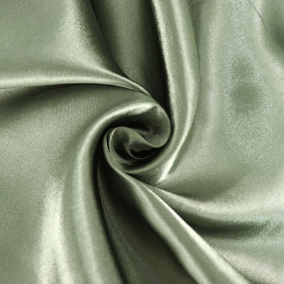 Green satin fabric with a smooth, shiny texture.