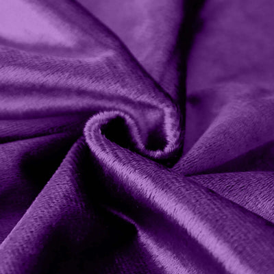 Close-up of luxurious purple fabric texture.