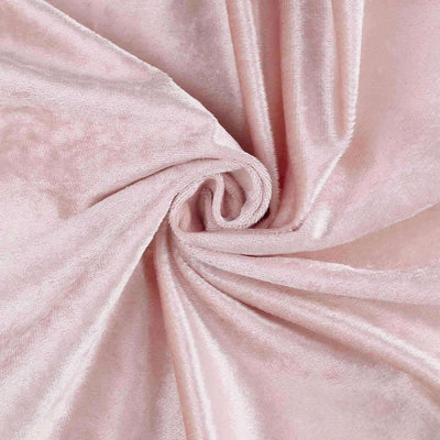 Soft pink velvet fabric swirl texture.