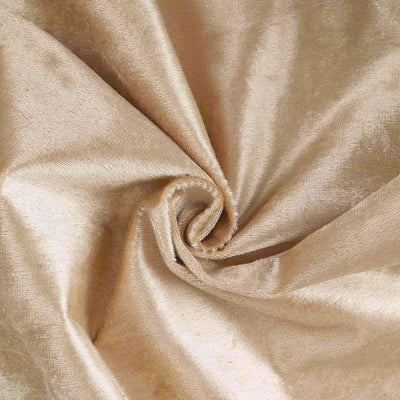 Close-up of luxurious golden fabric texture.