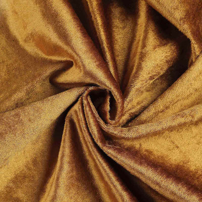 Luxurious golden fabric with a soft, velvety texture.