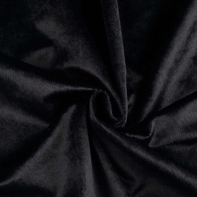 Black velvet fabric texture close-up, showcasing its soft and luxurious feel.