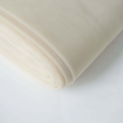 Cream-colored fabric roll on a white background