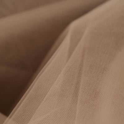 Brown tulle fabric with a soft, sheer texture.