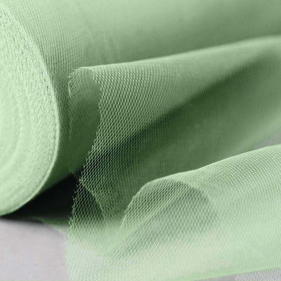Green tulle fabric roll with soft texture and delicate mesh detail.