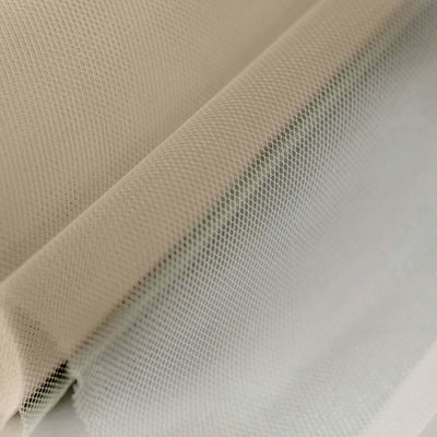 Sheer fabric in neutral tones, showcasing texture and drape.