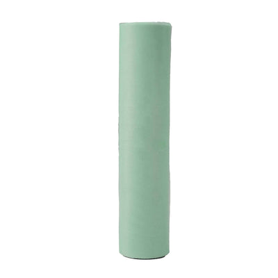 Mint green yoga mat rolled upright on a plain white background