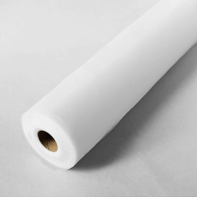 White fabric roll on a plain background