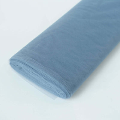 Light blue tulle fabric roll on a white background