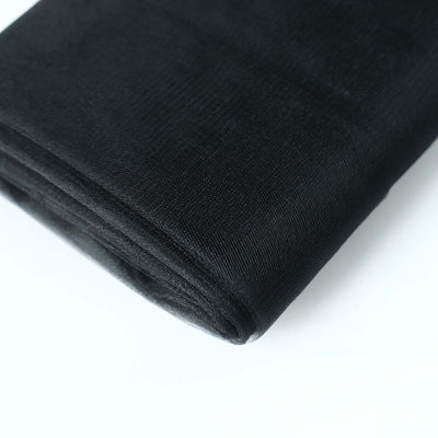 Black fabric roll on a white background