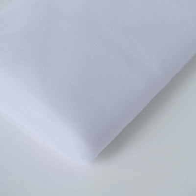 White fabric roll on a plain backdrop for sewing and crafting projects.