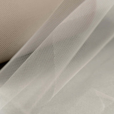 Delicate sheer fabric with fine netting texture.