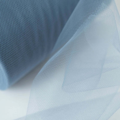 Light blue tulle fabric roll with soft drape on a white background.