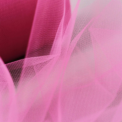 Pink tulle fabric with soft texture and layers.
