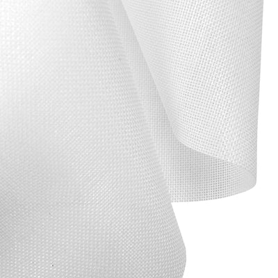 White textured fabric draping elegantly against a plain background.