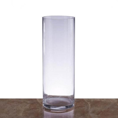 Clear glass vase on a marble surface.