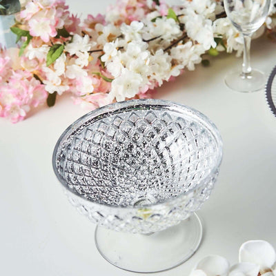 Glass dessert bowl with a diamond pattern, elegantly displayed.