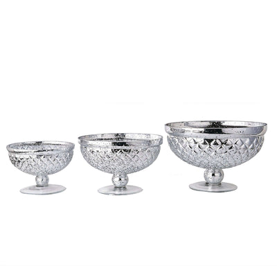 Set of three decorative silver glass bowls in varying sizes.