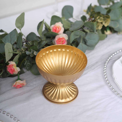 Gold vintage-style dessert cup with fluted design and elegant finish.