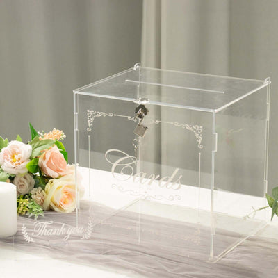 Acrylic wedding card box with lock and floral decoration.
