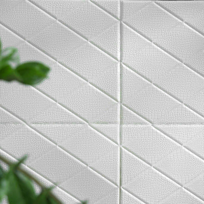 White textured fabric with a diamond pattern and subtle sheen.