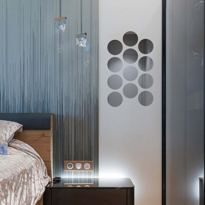 Modern bedroom with unique wall design and stylish lighting accents.
