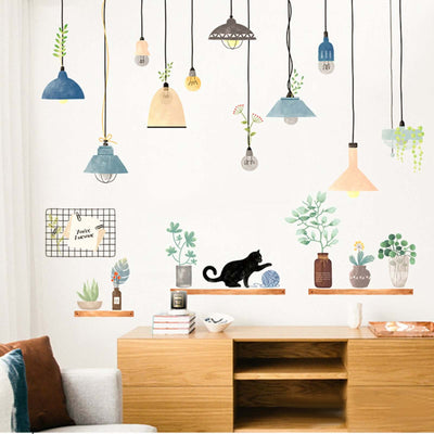 Decorative wall art featuring hanging lights and plants in a stylish interior setting.