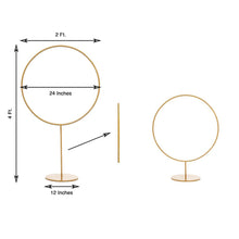 A gold metal pillar hoop ring balloon flower stand in the shape of a circle with measurements on it, placed against a floral backdrop décor