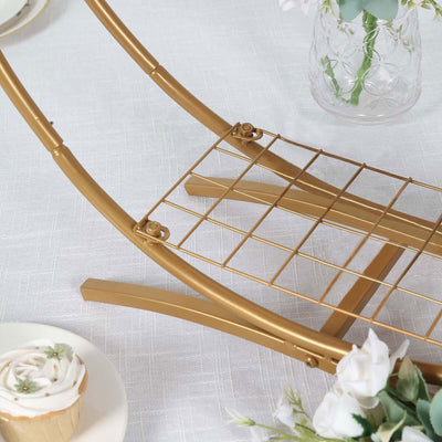 Gold wire rack with a grid pattern on a textured white tablecloth.