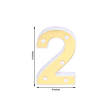 Yellow and white plastic number 2 with measurements of 6 inches and 4 inches