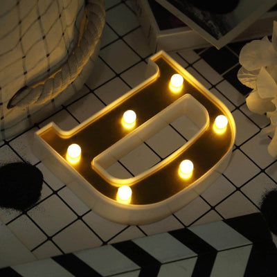 Decorative letter D marquee light with warm LED bulbs