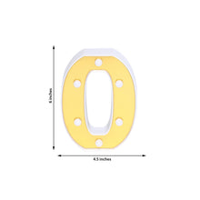 Indoor lighting - Yellow plastic letter O with measurements of 6 inches and 4.5 inches