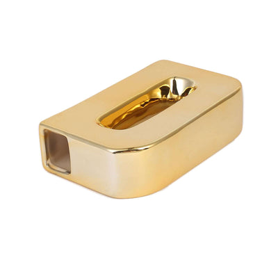 Gold rectangular tissue box holder with a sleek, modern design