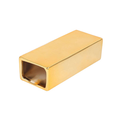 Gold rectangular metal object with a hollow center.