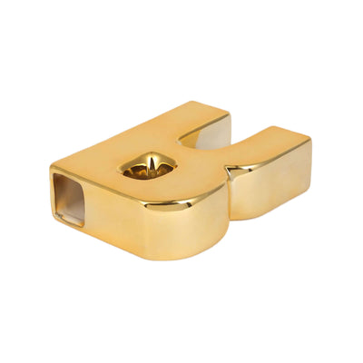 Gold letter "H" candle holder on a white background