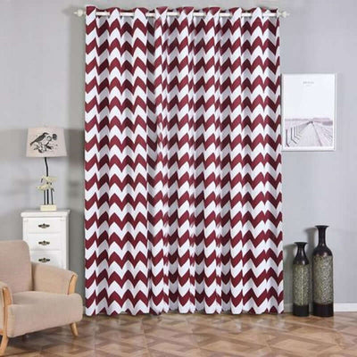 Chevron-patterned curtains in a stylish living room setting.