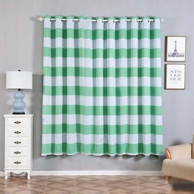 Green and white striped curtain in a stylish home setting.