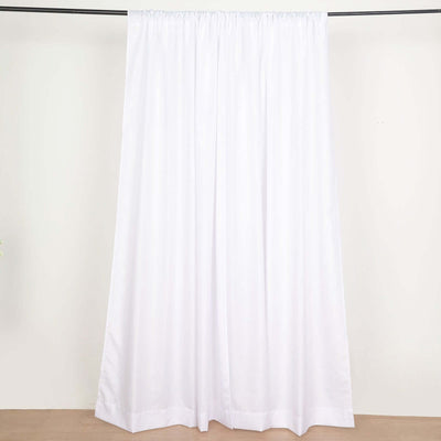 White curtain panel hanging on a rod, showcasing a smooth, elegant design.