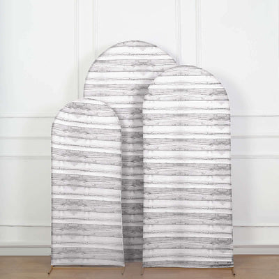 Set of three arched wooden wall decor pieces in varying sizes