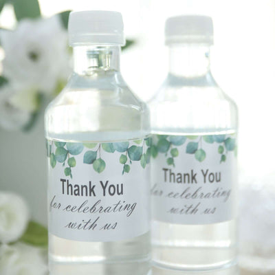 Thank you water bottles with decorative labels for celebration events.